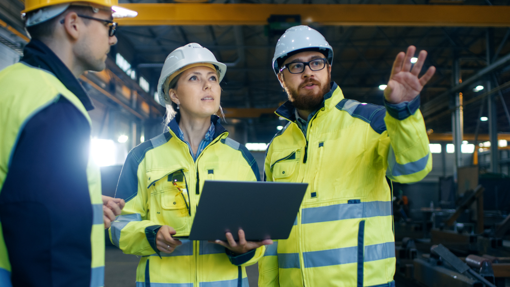 construction workings planning with laptop